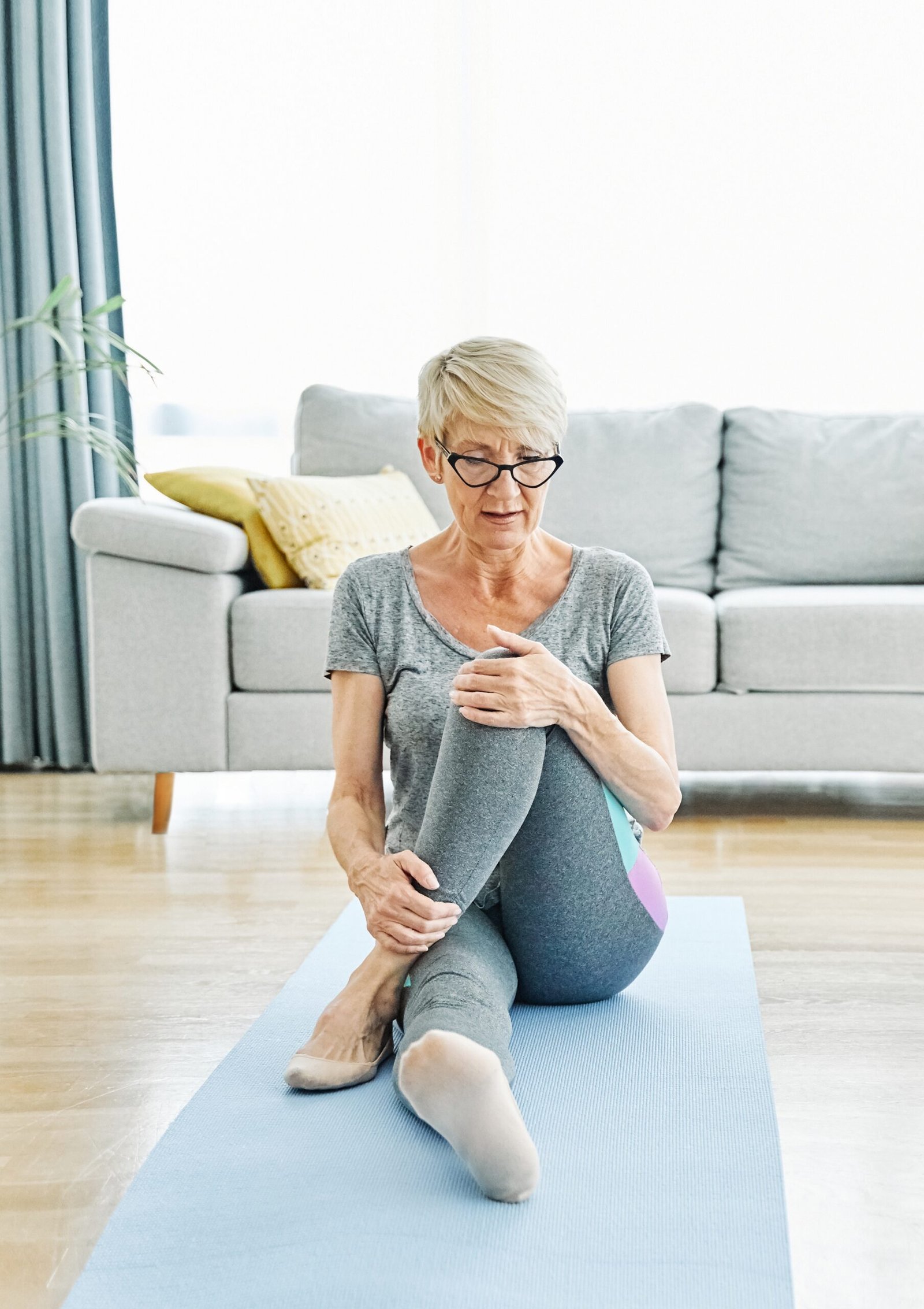 senior,woman,exercise,stretching,yoga,at,home,,health,care,rehabilitation